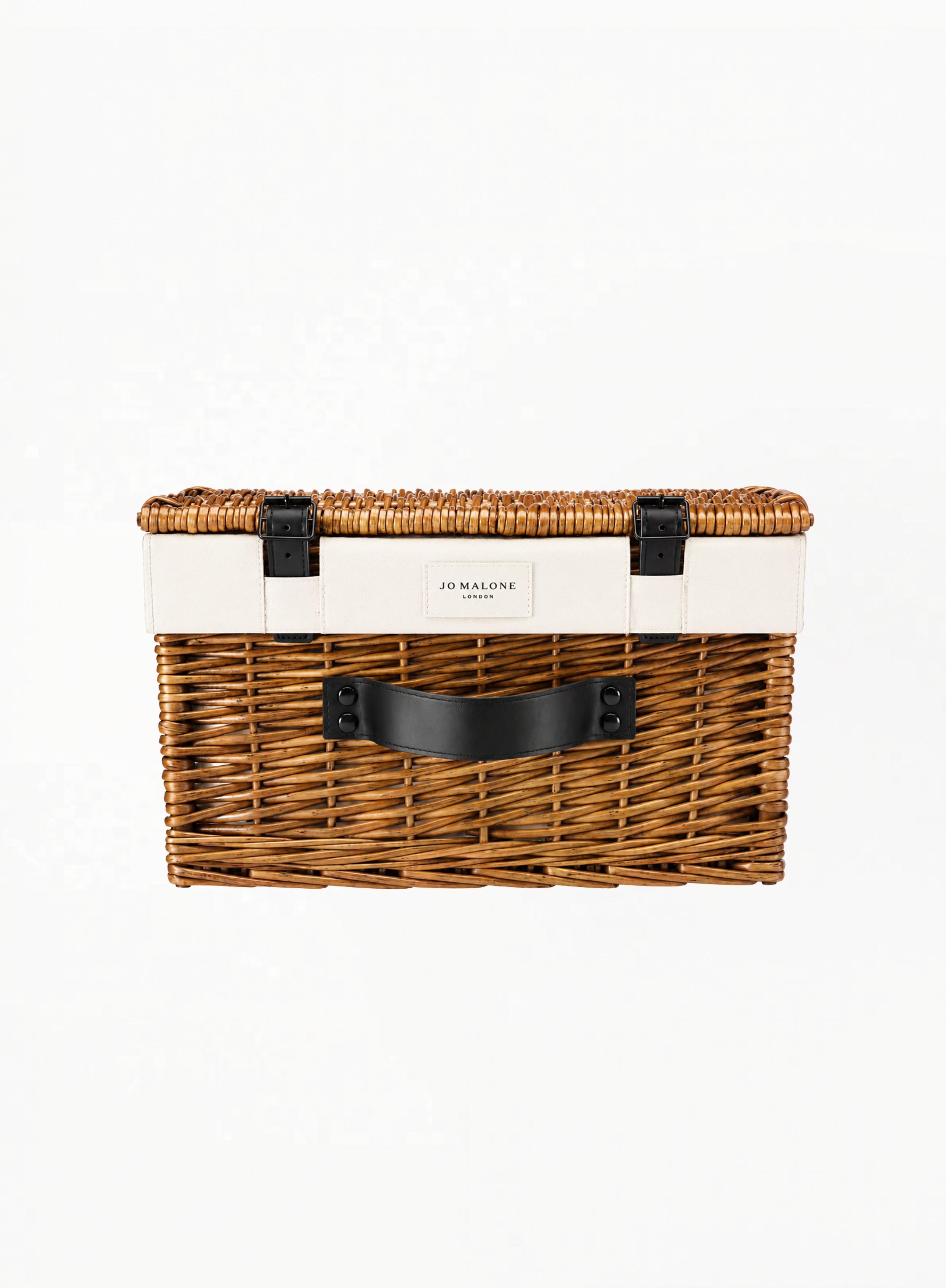 JO MALONE LONDON woven Christmas hamper with natural wicker construction, leather-look details, and a sturdy handle on a white background.