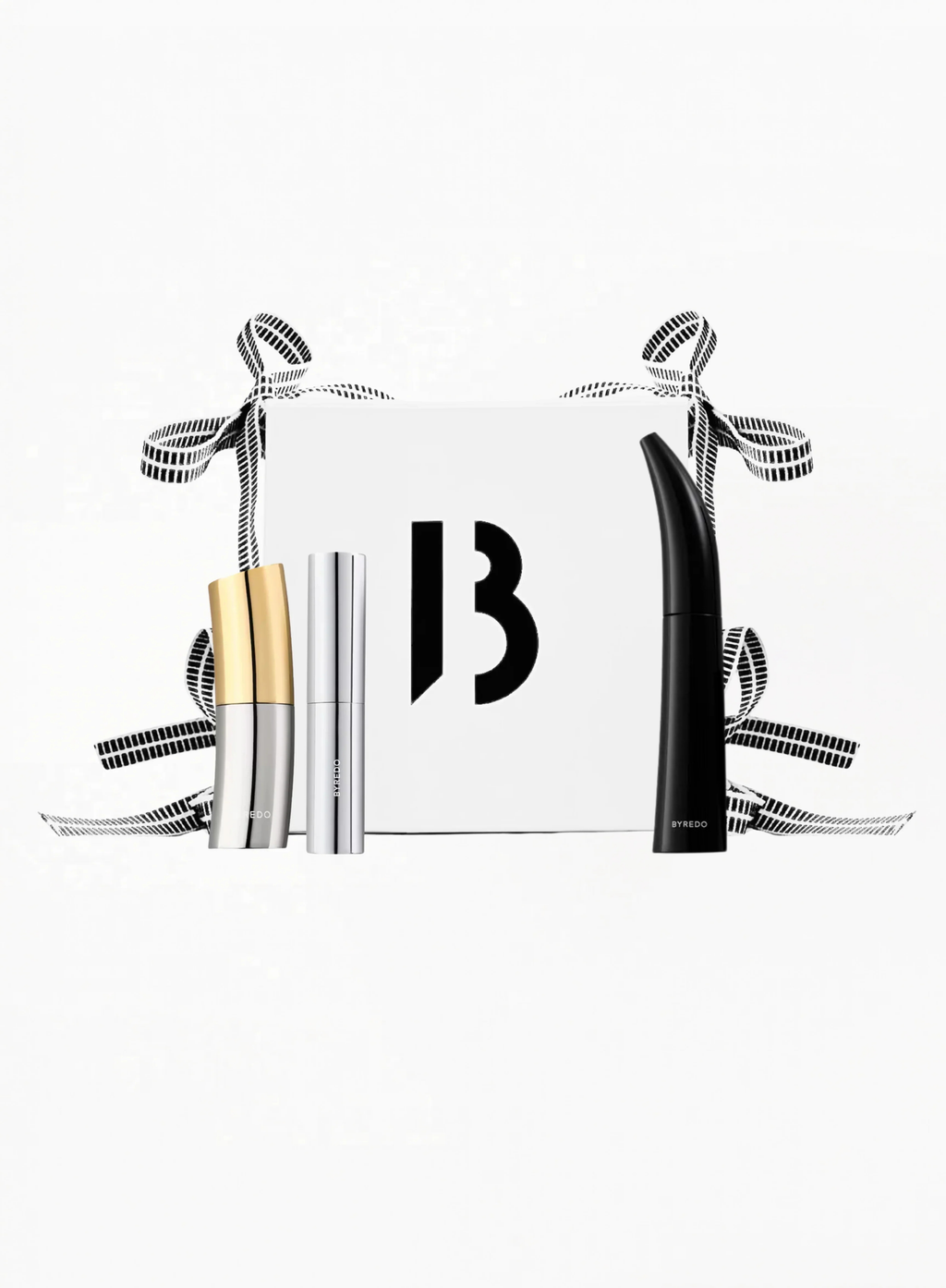 BYREDO beauty gift set featuring Colour Stick Ultramagnetic, Semi-Formal lipstick, and Mascara Eroded Echo and white box with ribbons and B (byredo) logo and white background