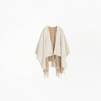 Guerlain collector’s cape displayed on a neutral background — authentic luxury accessory available at Exquisite