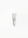 White tube of Byredo Blanche on a white background