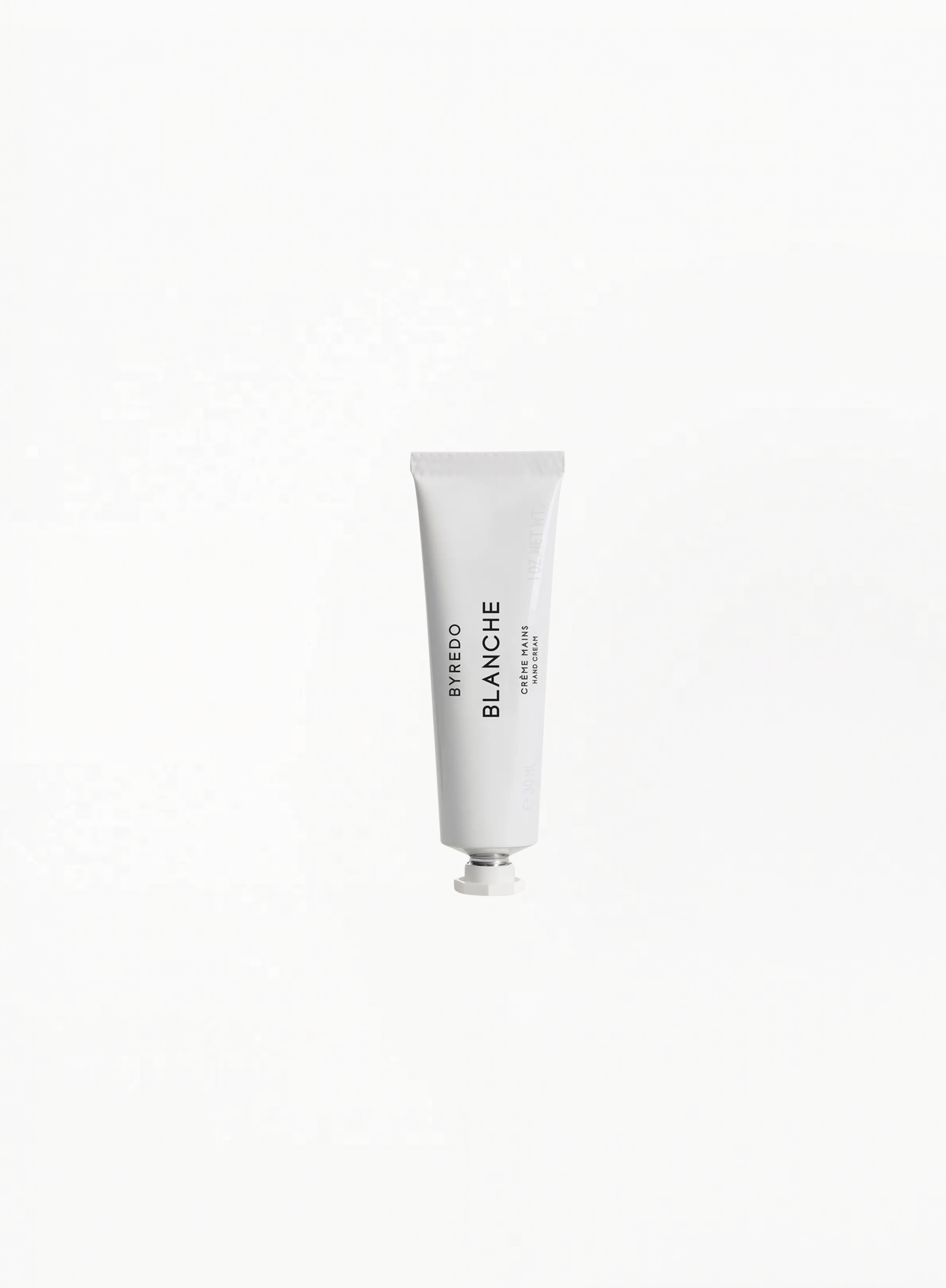 White tube of Byredo Blanche on a white background
