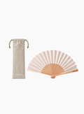 PRADA folding hand fan in soft beige and blush striped fabric with a natural wood frame, displayed alongside a matching beige drawstring pouch with PRADA logo on a clean light background. Available at Exquisite.