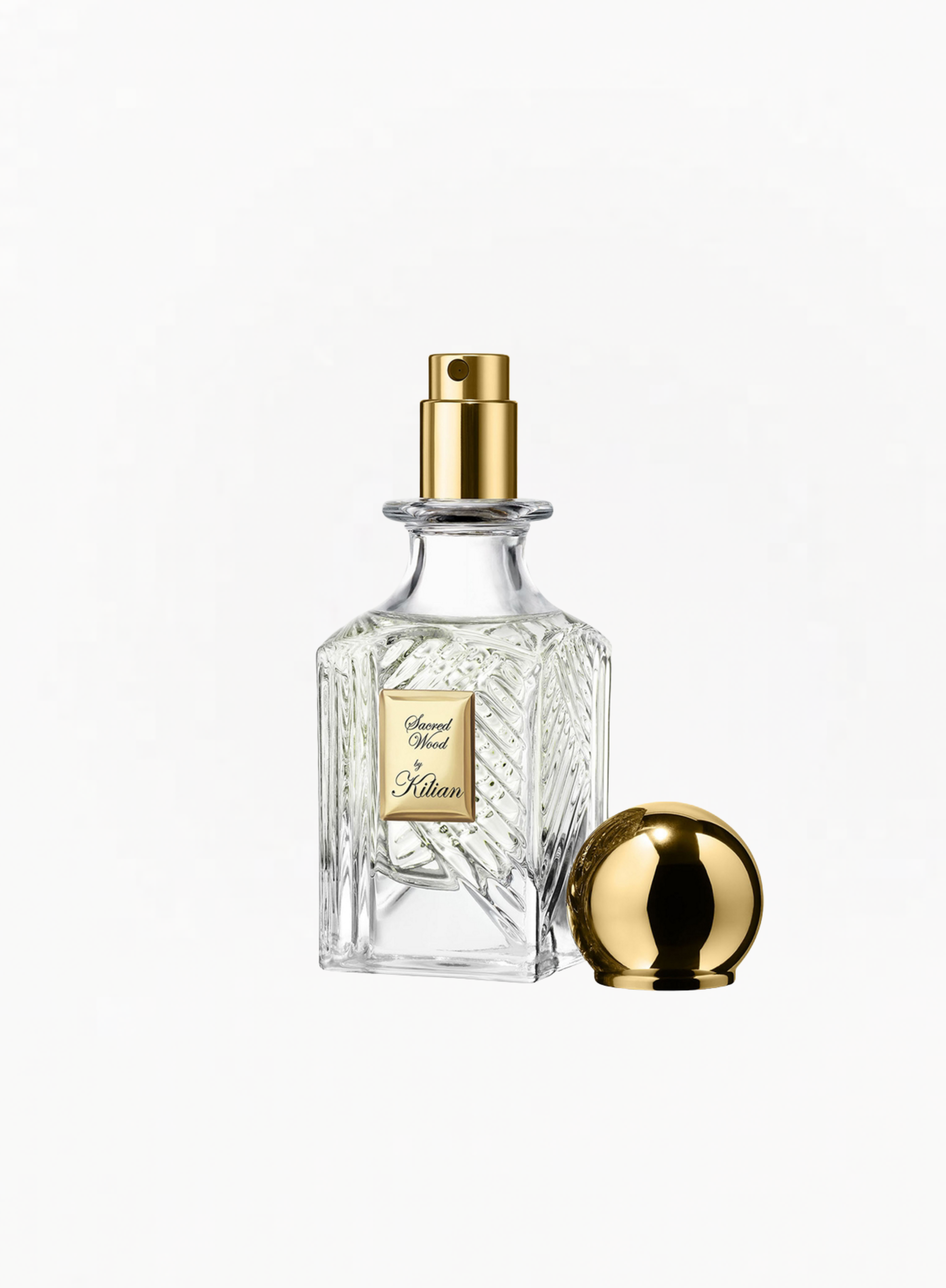 Kilian Paris Sacred Wood Eau de Parfum 30ml faceted crystal spray bottle with detached gold sphere cap on white background
