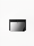 Tom Ford black mirror card with black leather-effect case and TF logo, photographed on a clean background. Authentic Tom Ford accessory available at Exquisite.