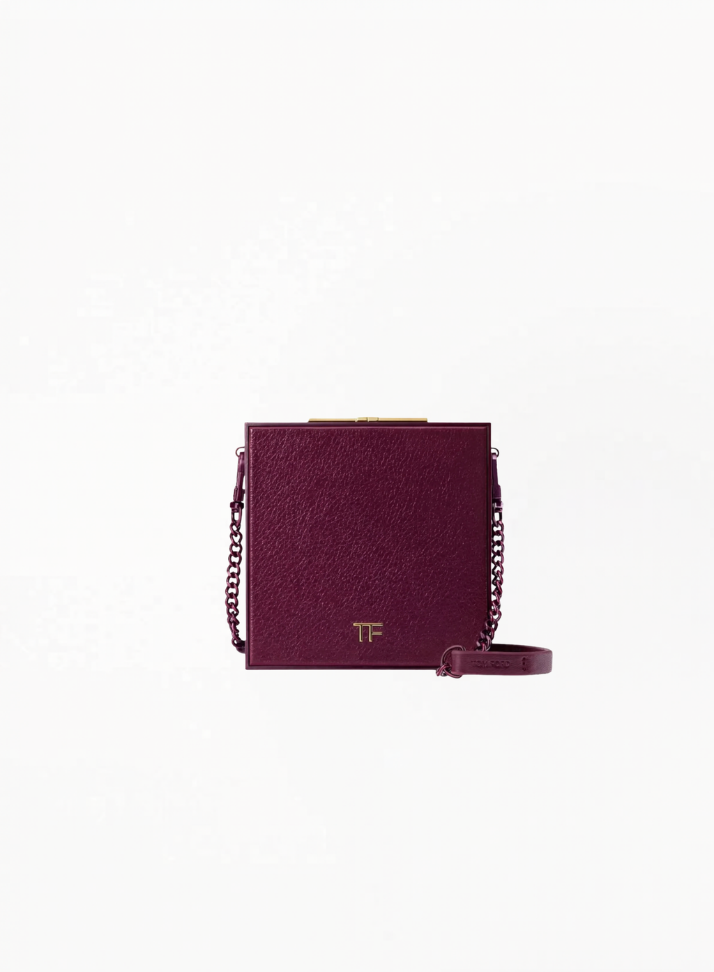Tom Ford limited edition burgundy mini bag with elegant luxury design and compact silhouette, photographed on a clean background. Authentic Tom Ford accessory available at Exquisite. 