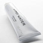 Gypsy Water hand cream tube on a light gray background