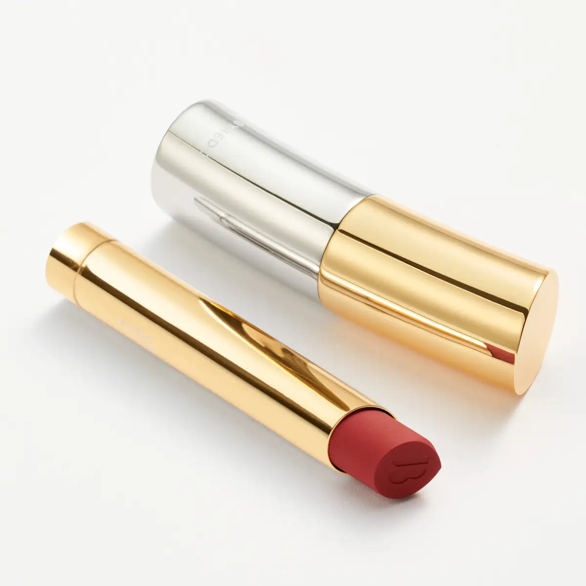 Byredo Matte Lipstick Reunion 109 refillable lipstick gold case detail
