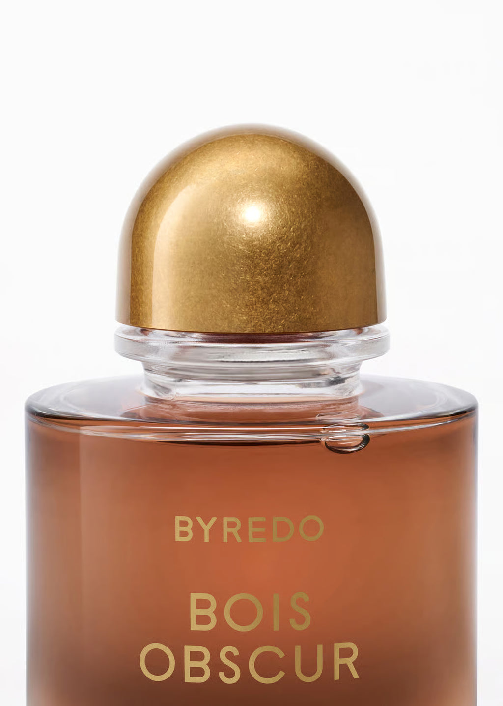 Byredo Bois Obscur perfume bottle with gold cap on a white background