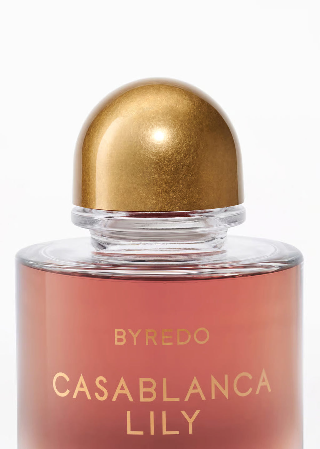 Byredo Casablanca Lily perfume bottle with gold cap on a white background