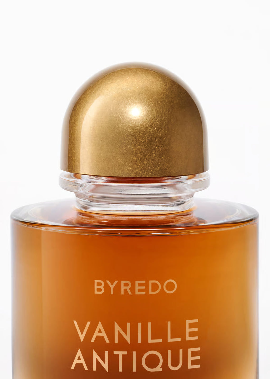 Byredo Vanille Antique perfume bottle with gold cap on a white background