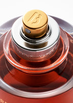 Byredo Rouge Chaotique Extrait de Parfum 70ML Night Veils red bottle with antique gold cap on white background
