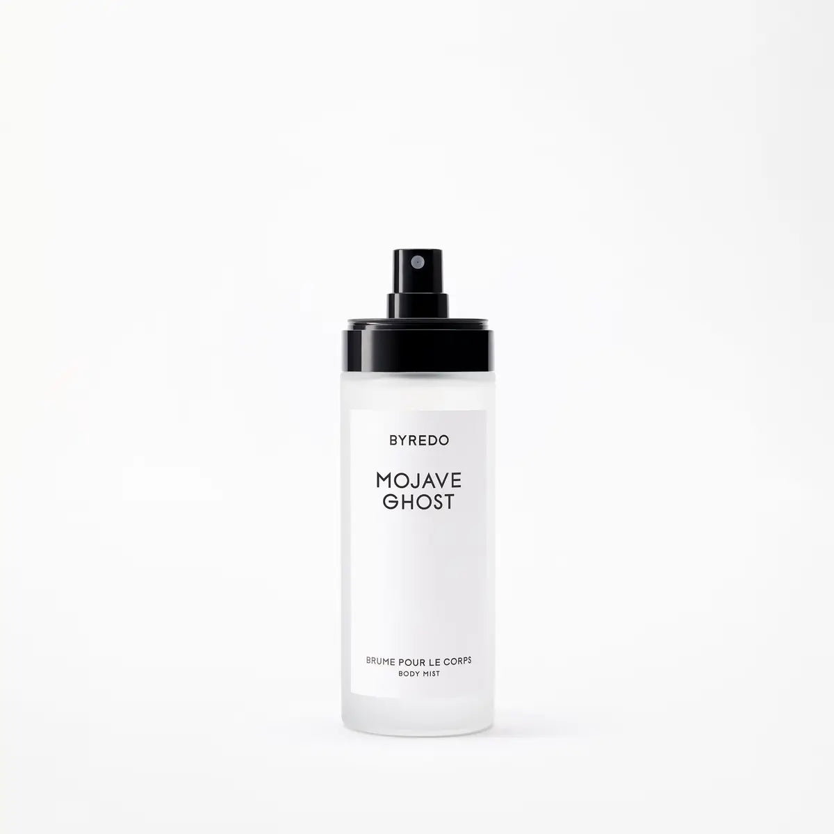 BYREDO Mojave Ghost Body Mist in a frosted white bottle with a black spray cap and minimalist label on a clean light background.